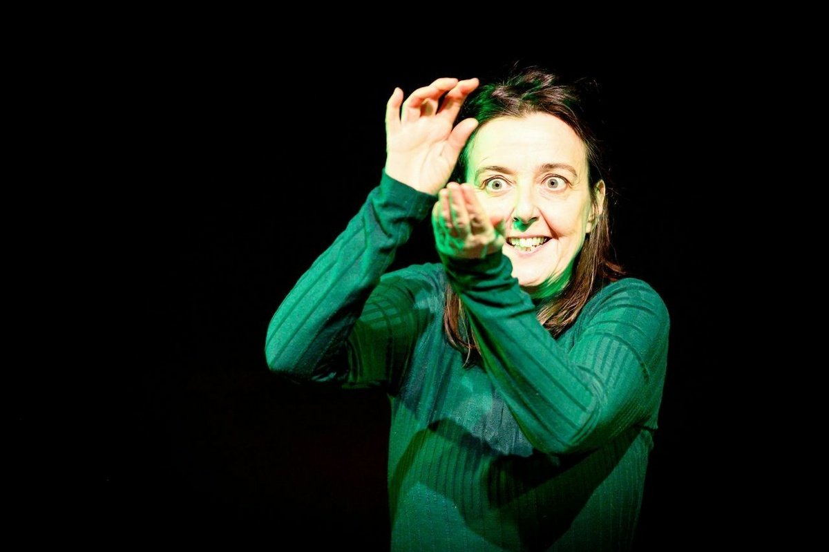 Leader of the workshop, Pyn Stockman, is seen in green gessticulting with her arms