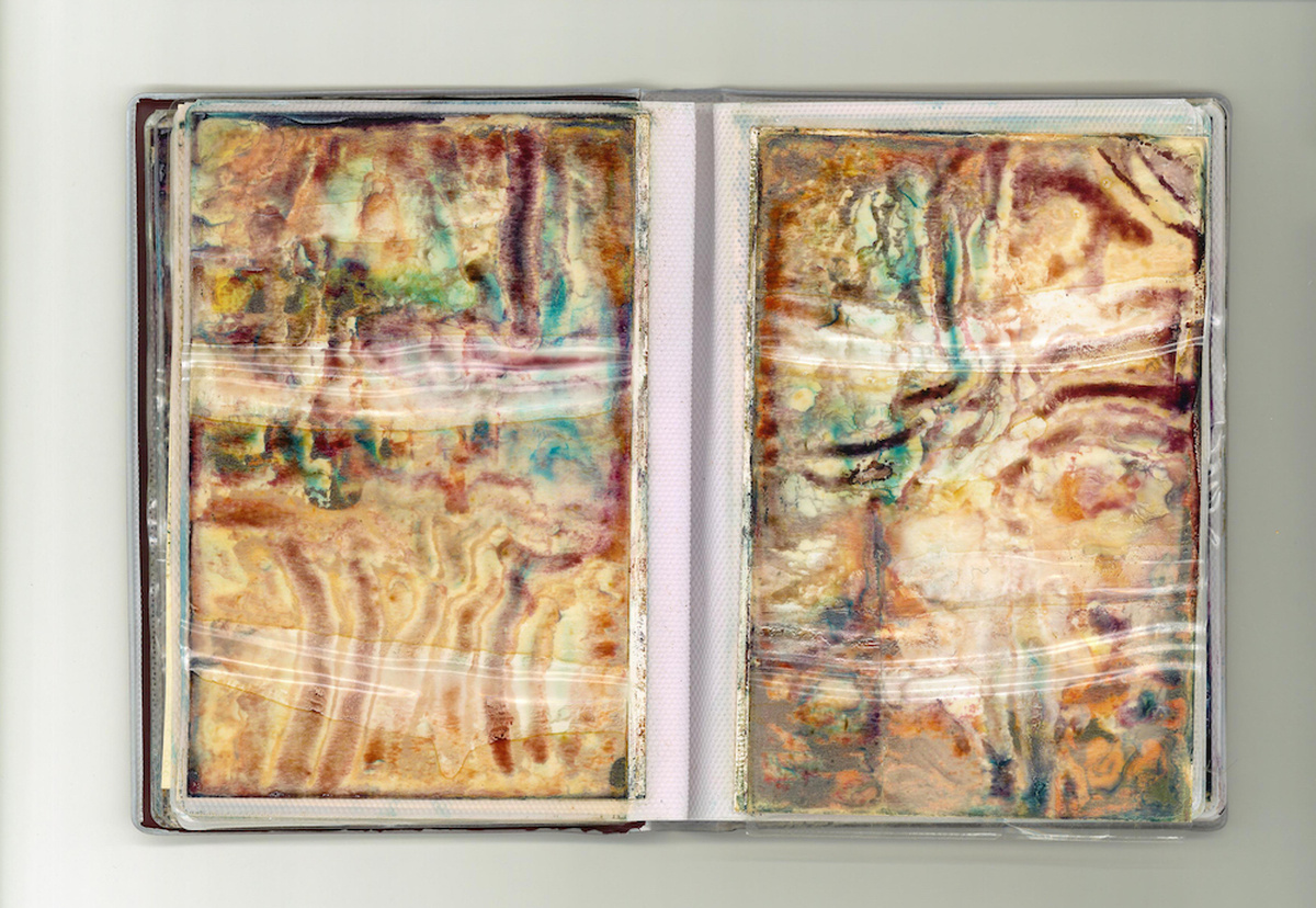Two rectangular paintings in abstract style, in cream, blue and pink.