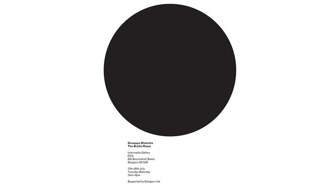 A black circle on a white background