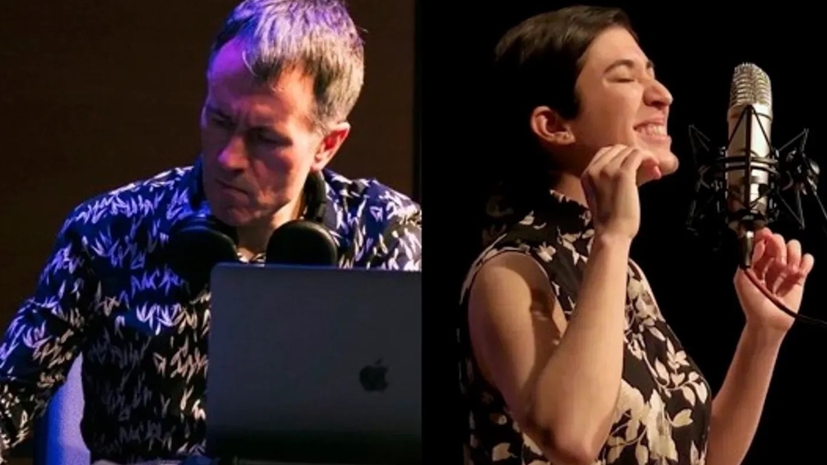 On the left is Alistair, performing electronics. On the right is Stephanie, singing into a microphone.
