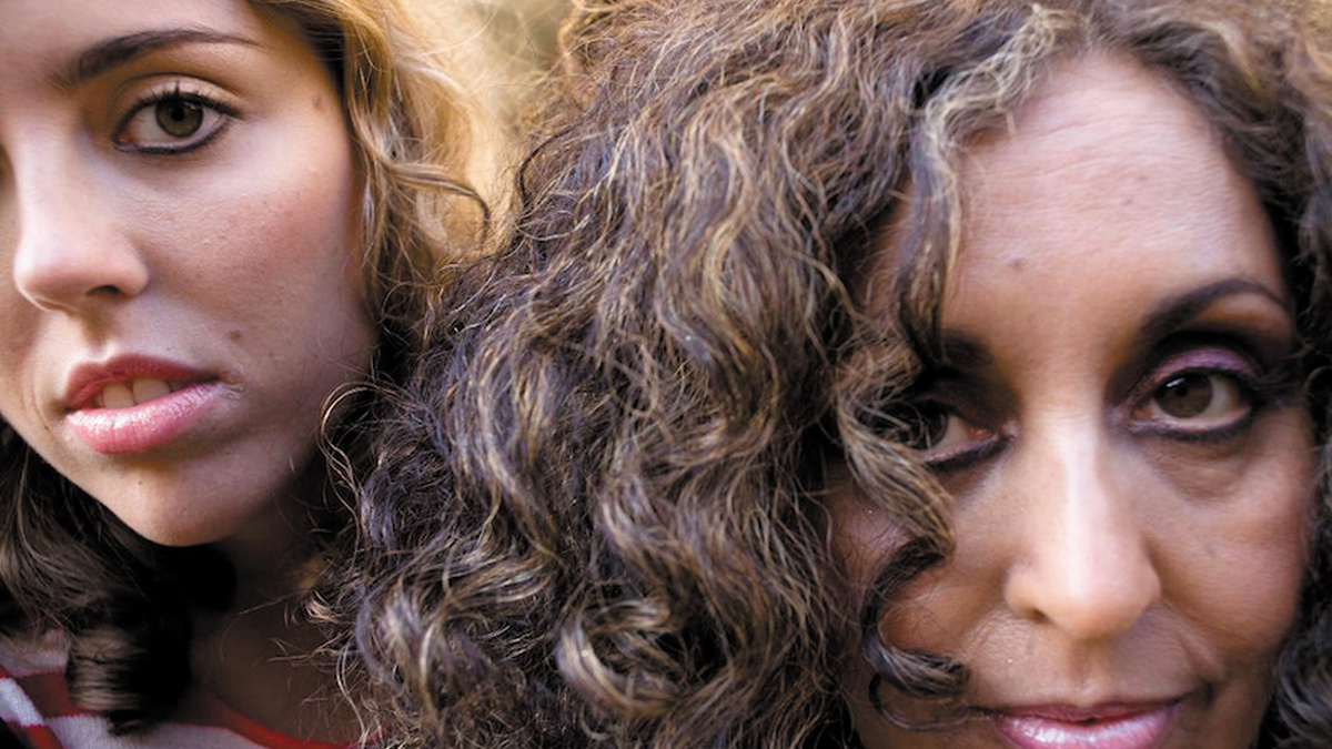 A close-up of two women's faces