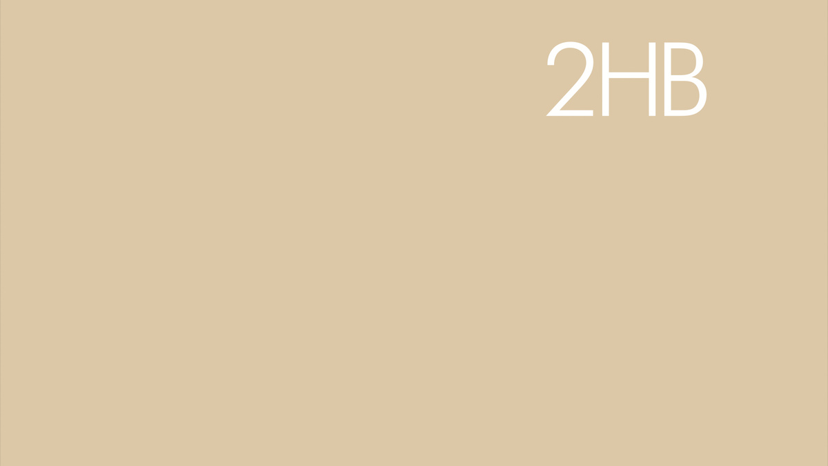 A beige image with 2HB written in the top right corner