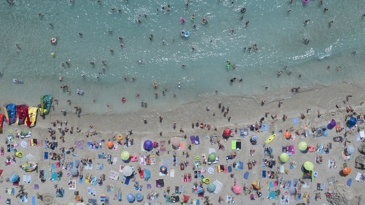 An overhead shot of a crowded beach.