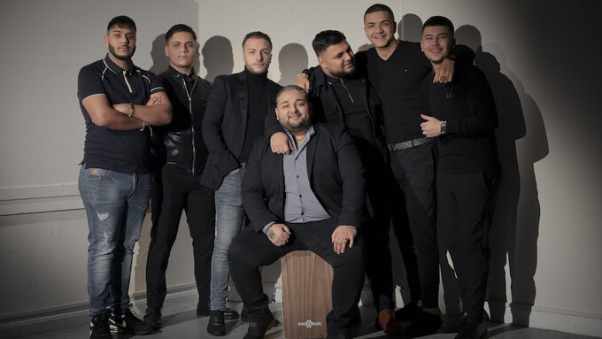Photo of ZOR, a seven piece band of young Roma musicians.