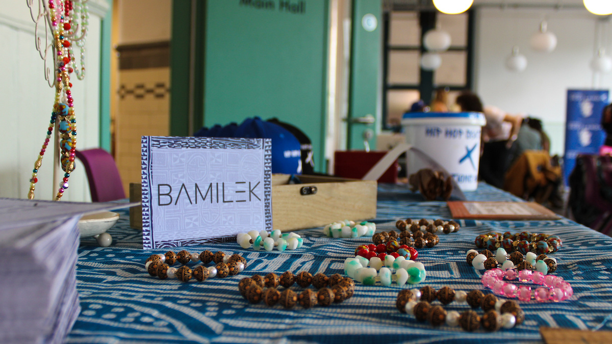 A photograph of a stall table with various pieces of jewllery created by BAMILEK