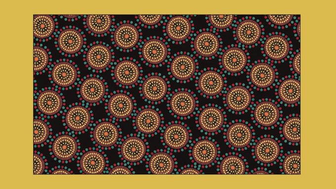 Image of a bright Kaleidoscope pattern with colours of orange, yellow, red, green and black.