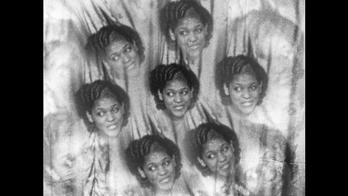 A kaledoscopic image of a woman smiling.