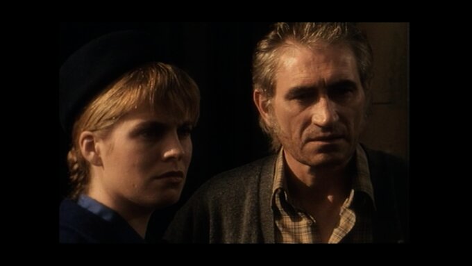 Dark image of a man and woman / the actors Wilma Kennedy and Ken Hutcheson