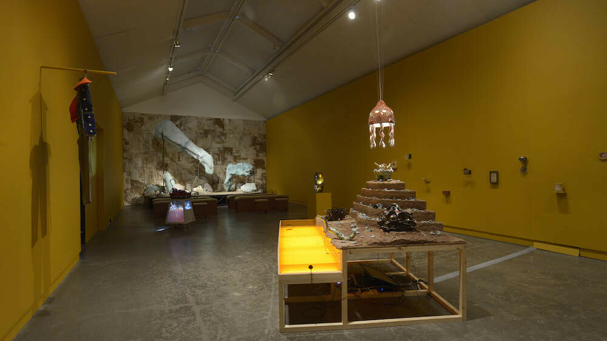 A photo of an exhibition by Rae-Yen Song, the gallery space is filled with objects and artefacts.