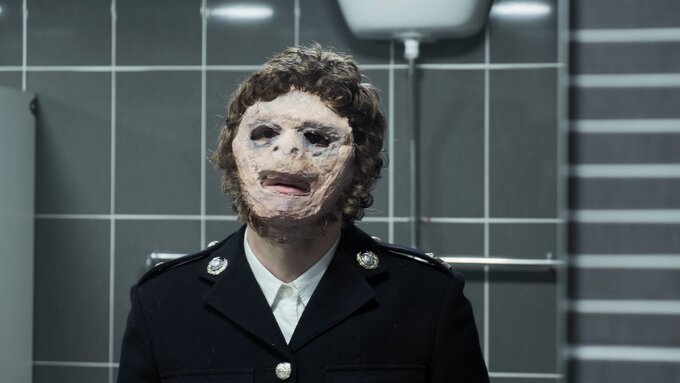 Neanderthal Man in a public bathroom.