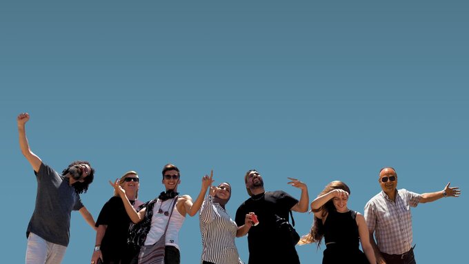 A group of 7 Palestinian comedians of various ages and genders.