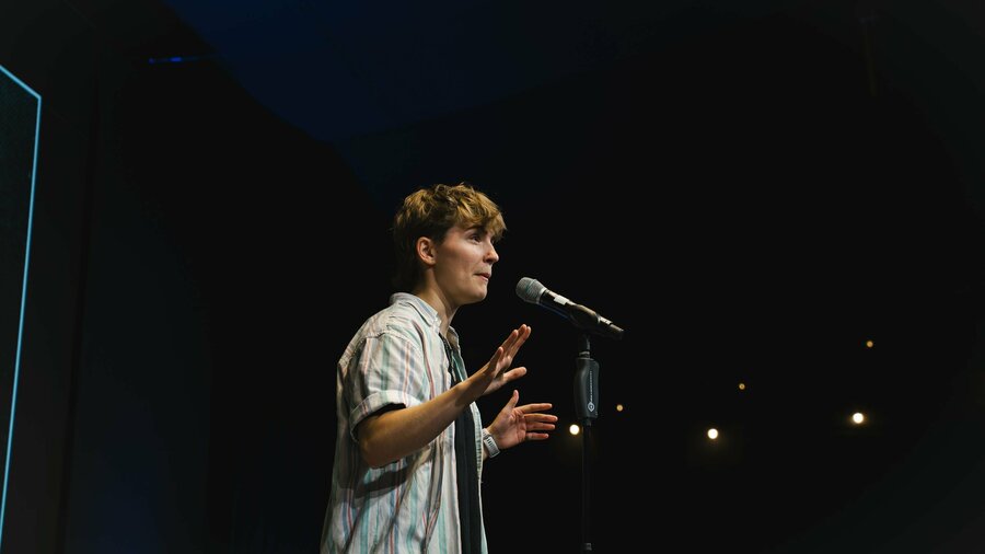 Arlo Bayne performing at the Lod Poets 2025 Grand Slam Final