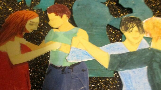 The image shows various couples dancing tango together. The background is gold and glittery.