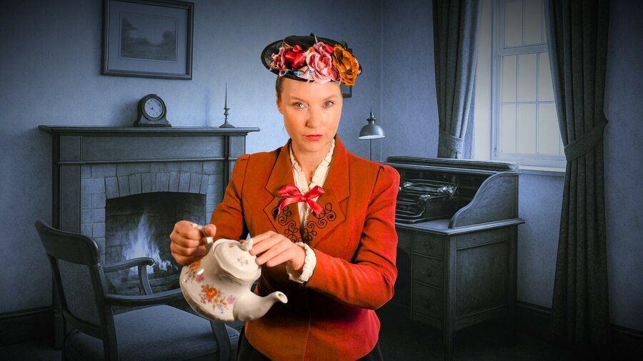 Brightly coloured Mary Poppins looks into the camera defiantly while pouring a teapot. The background is a dark study.