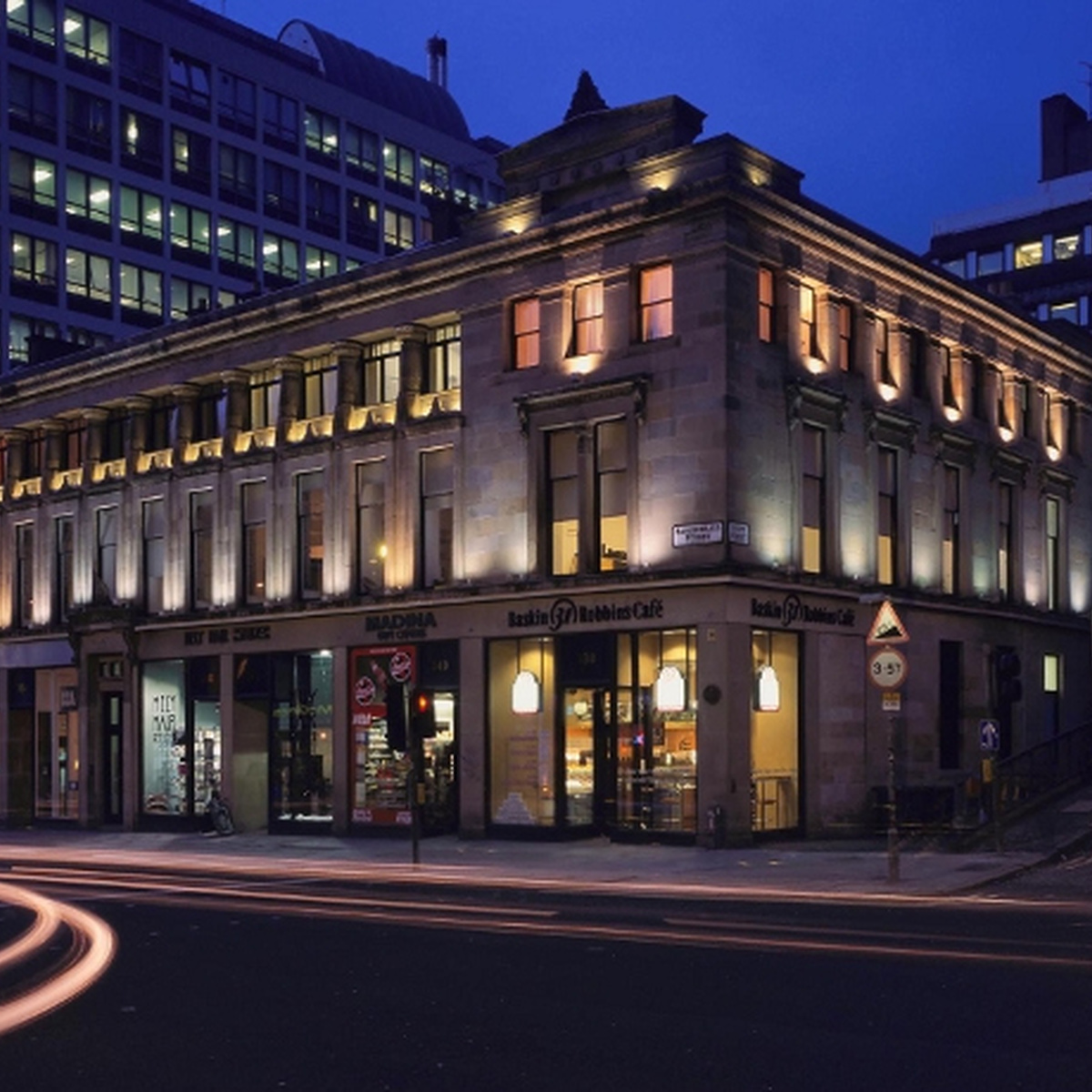 The CCA building photographed from outside at night.