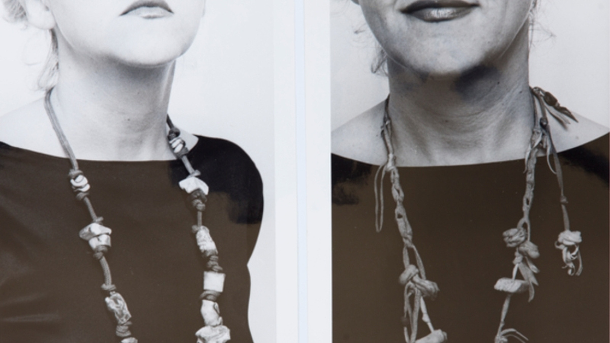 Two black and white photographs of a person wearing a long necklace, framed from their lips to their torso.