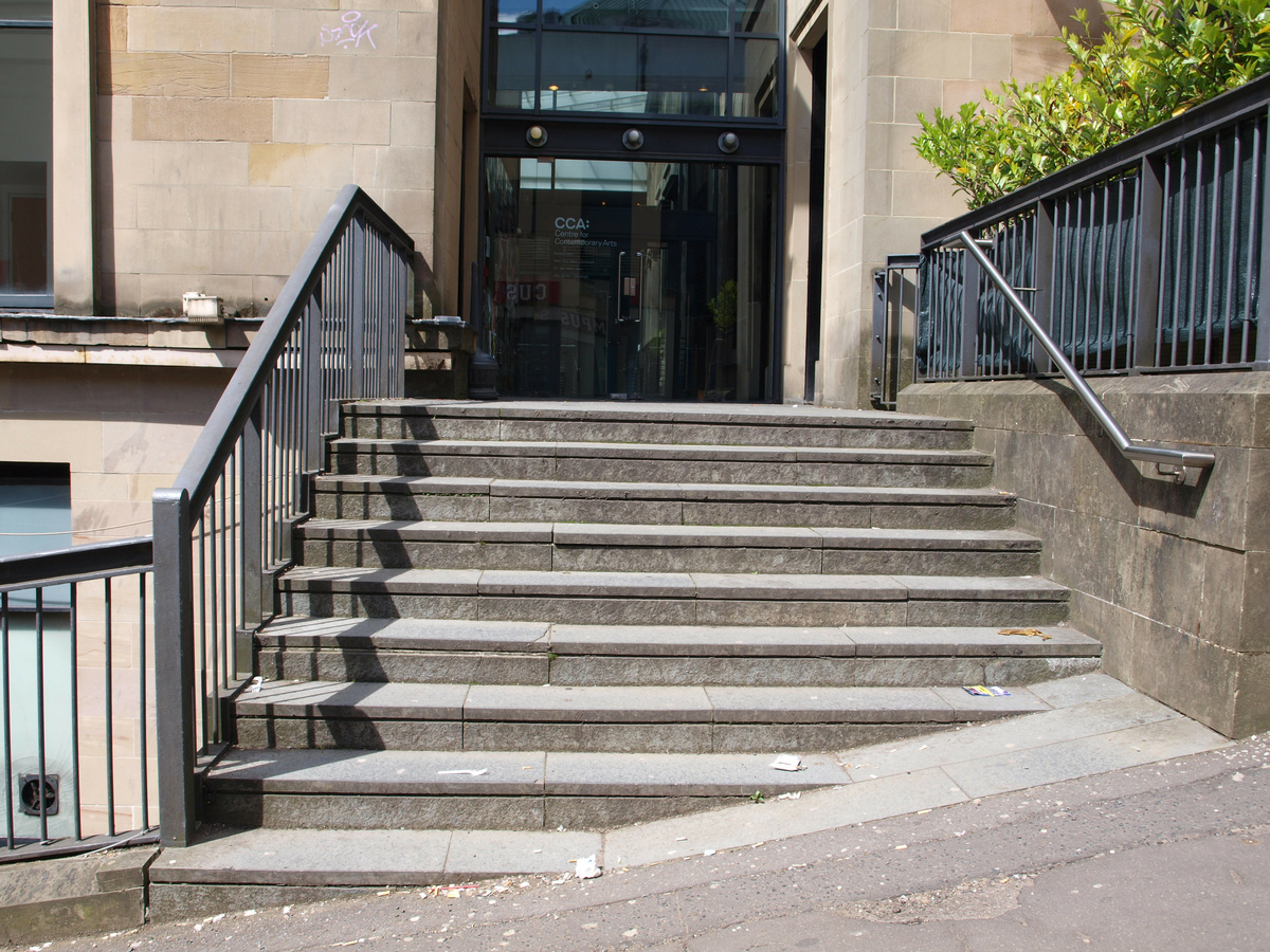 A photograph of the stairway to the entrance from Scott Street.