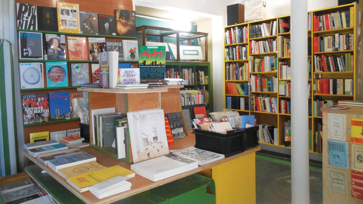 A photo of Aye Aye book shop, with lots of brightly coloured books.